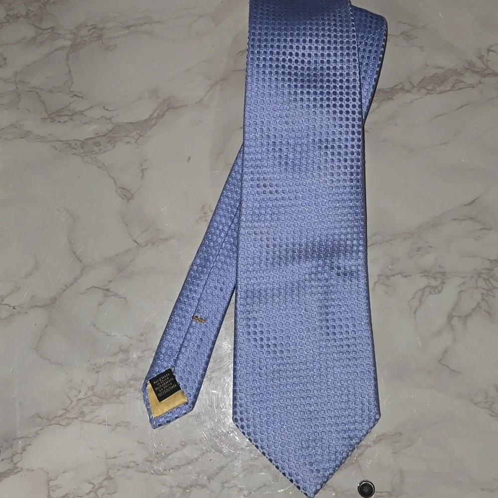 Sophisticated Light Blue Textured Tie By Donald Trump